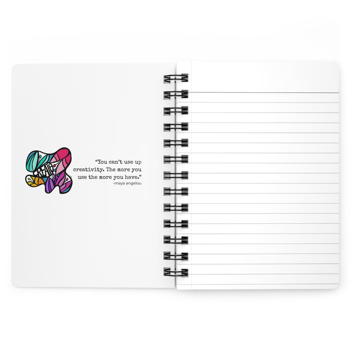 Inside cover of 'create' journal showing abstract tulip drawing and a creativity quote by Maya Angelou