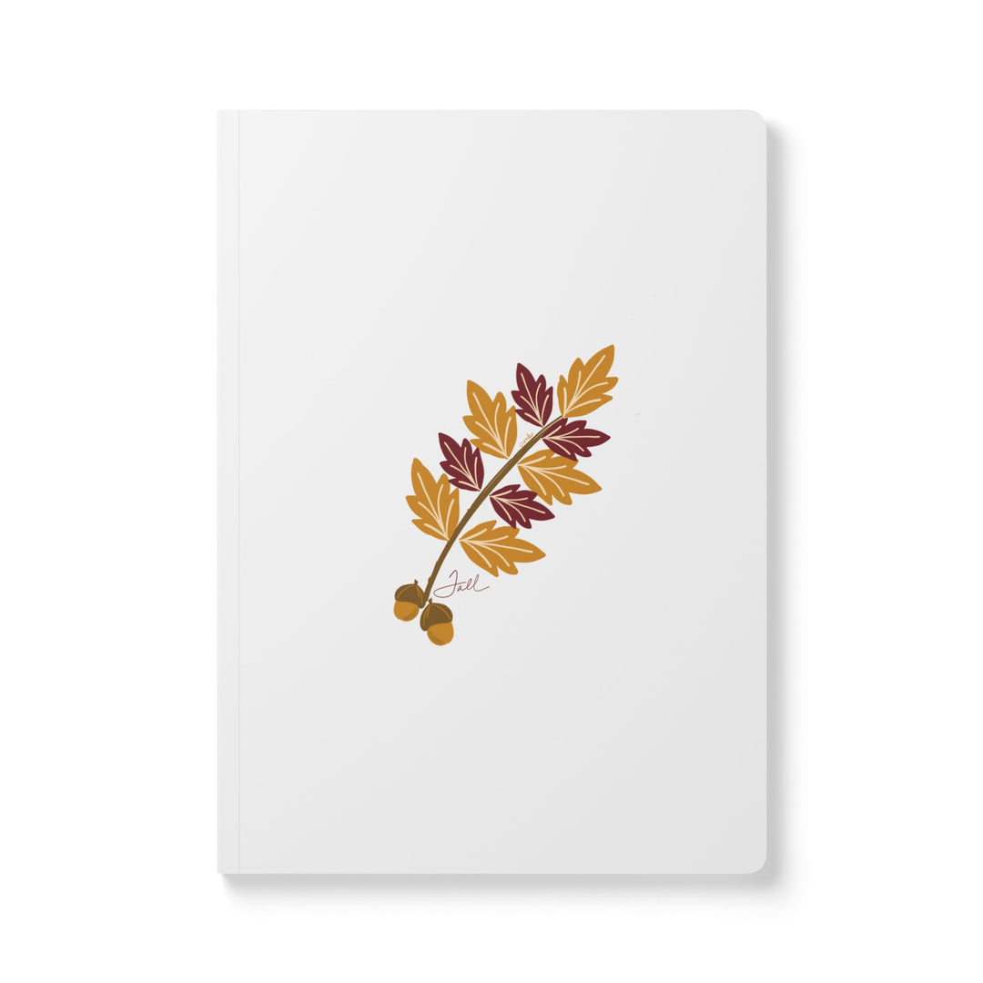 Fall leaves in gold and burgundy with acorns on the cover of the Fall journal for the Seasons stationery collection by Annmarie Boyle